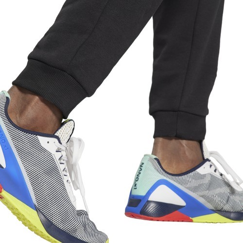 Мужские спортивные брюки Reebok Evostripe Crew Medium Blue Black HG3191