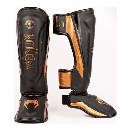 Venum Elite Evo Shinguards - melni/bronzas krāsas