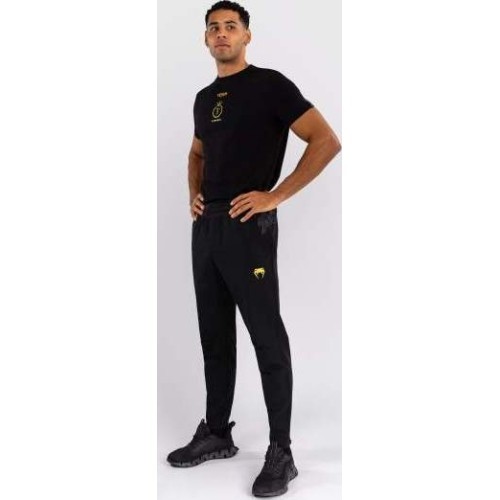 Спортивные брюки Venum x Topuria Unmatched Edition - чёрный/золотой