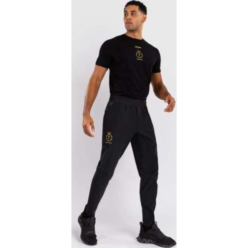 Спортивные брюки Venum x Topuria Unmatched Edition - чёрный/золотой
