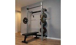 Pie sienas stiprināms bīdāms spēka statīvs ar soliņu KLT34 pelēks HMS Fitness