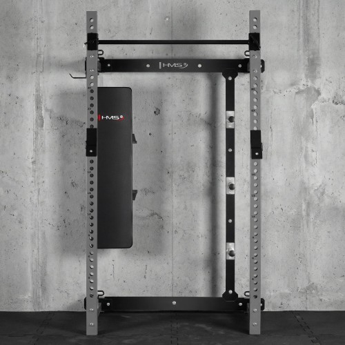 Pie sienas stiprināms bīdāms spēka statīvs ar soliņu KLT34 pelēks HMS Fitness
