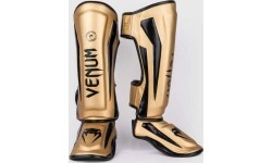 Защита голени Venum Elite Standup, золотисто-чёрная