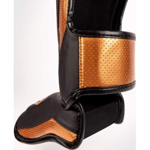 Venum Elite Evo apakšstilbu sargi, melni/bronzas