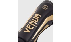 Apakšstilbu aizsargi Venum Elite Standup, melni/zelta