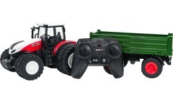 Sarkans tālvadības traktors ar zaļu puspiekabi